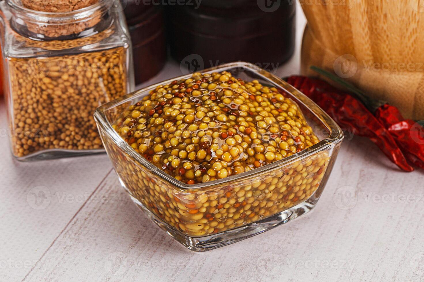 Spicy mustard sauce with seeds photo