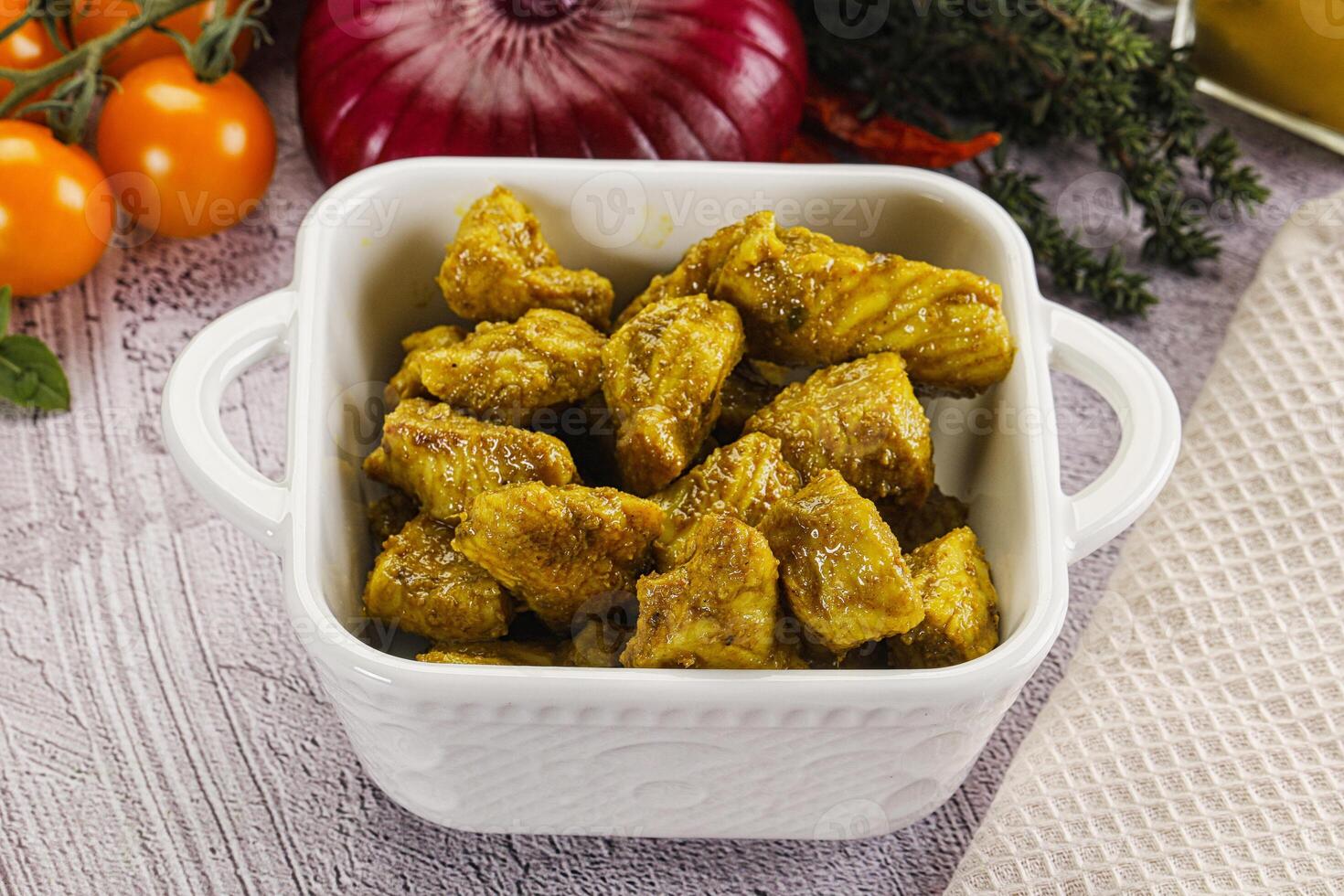 Indian cuisine curry chicken fillet photo