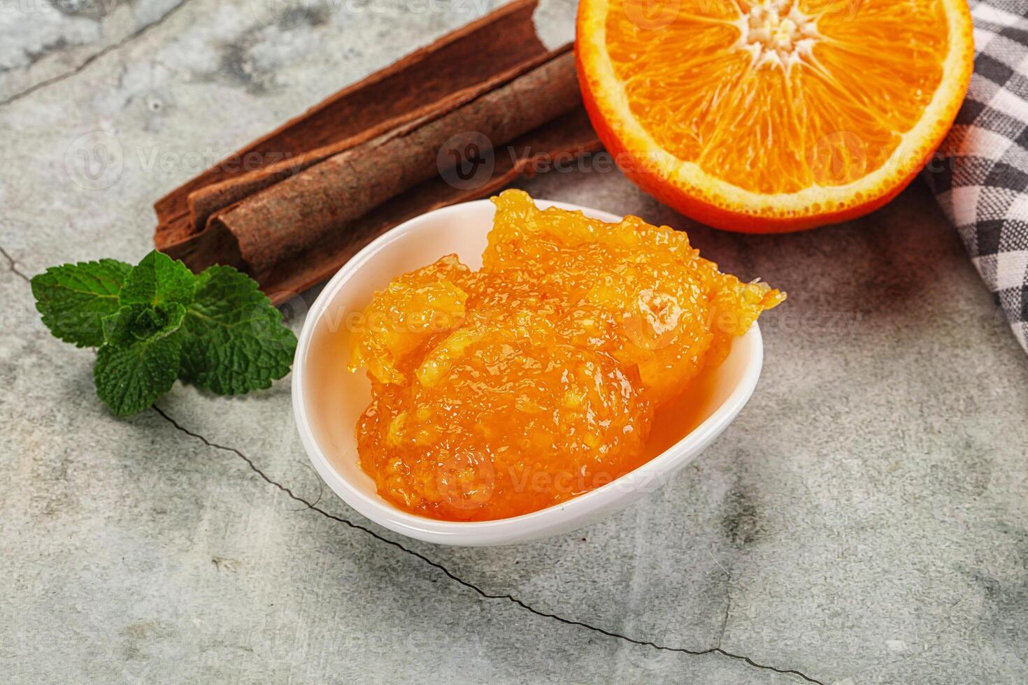 Tasty homemade Orange jam in the bowl photo