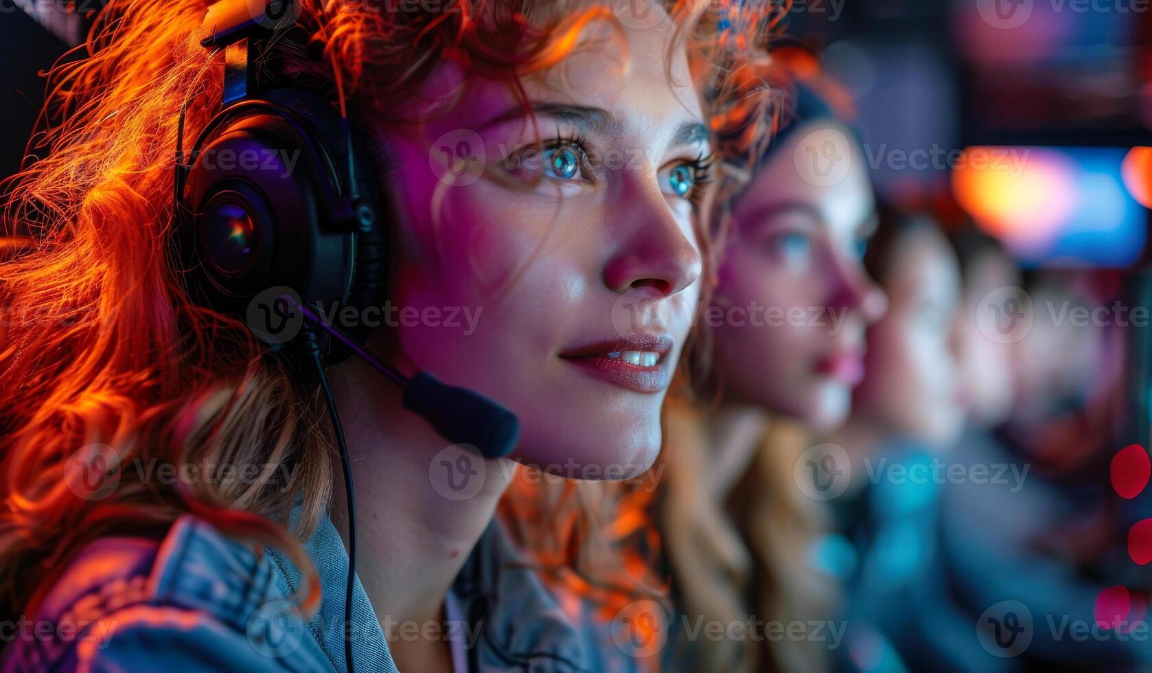 A woman wearing a headset and smiling at the camera. She is the only one in the image photo