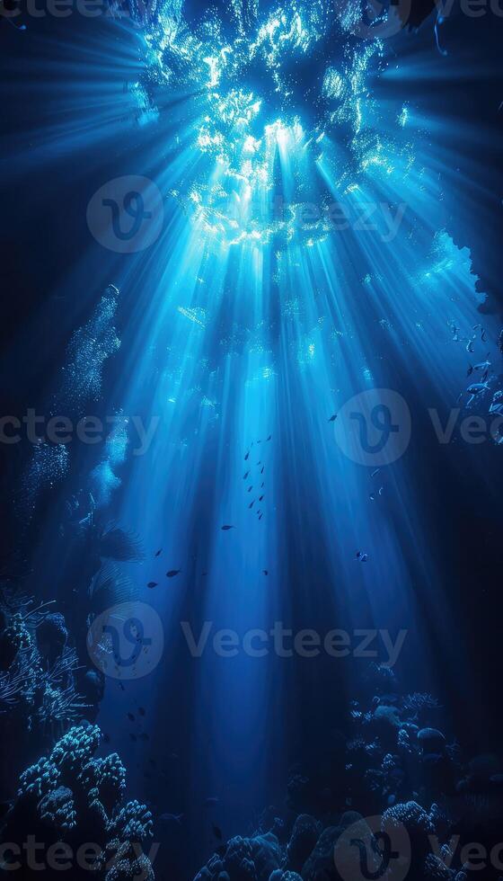 The bright sun shines beautifully through the bubbles found in the ocean photo