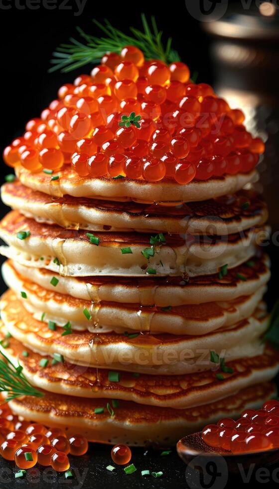 fried pancakes with red caviar photo