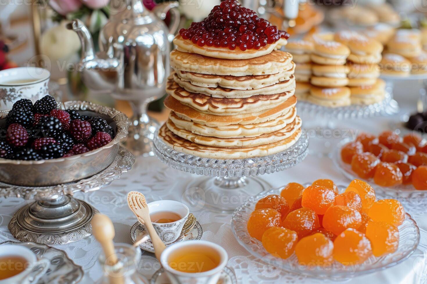 fried pancakes with red caviar photo