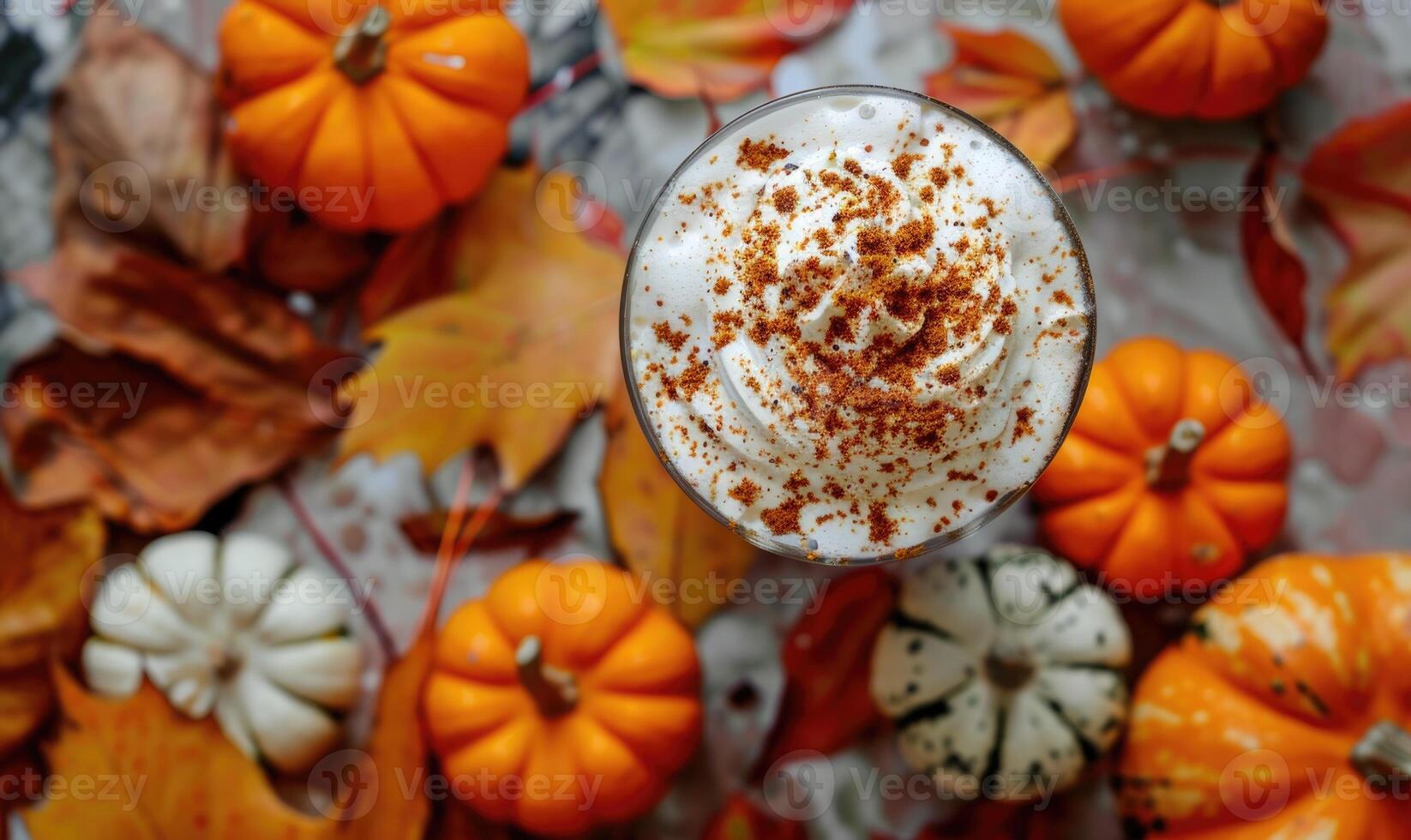 A pumpkin spice affogato with vanilla ice cream and a shot of espresso photo