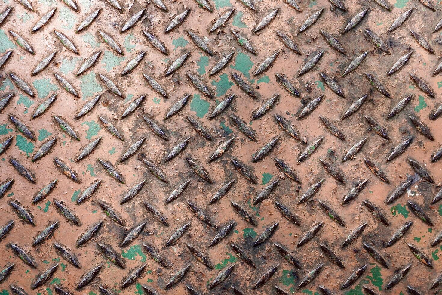 Old and rusty metal flooring surface texture isolated on horizontal full frame background. photo