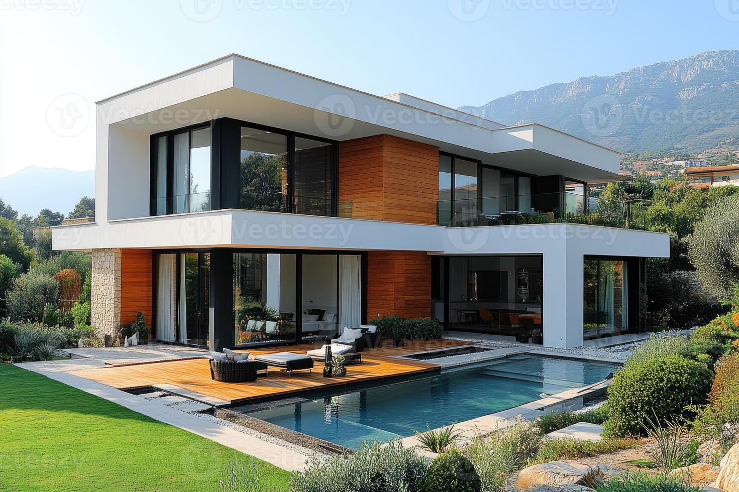 Modern house with swimming pool is standing in the middle of a luxurious garden photo