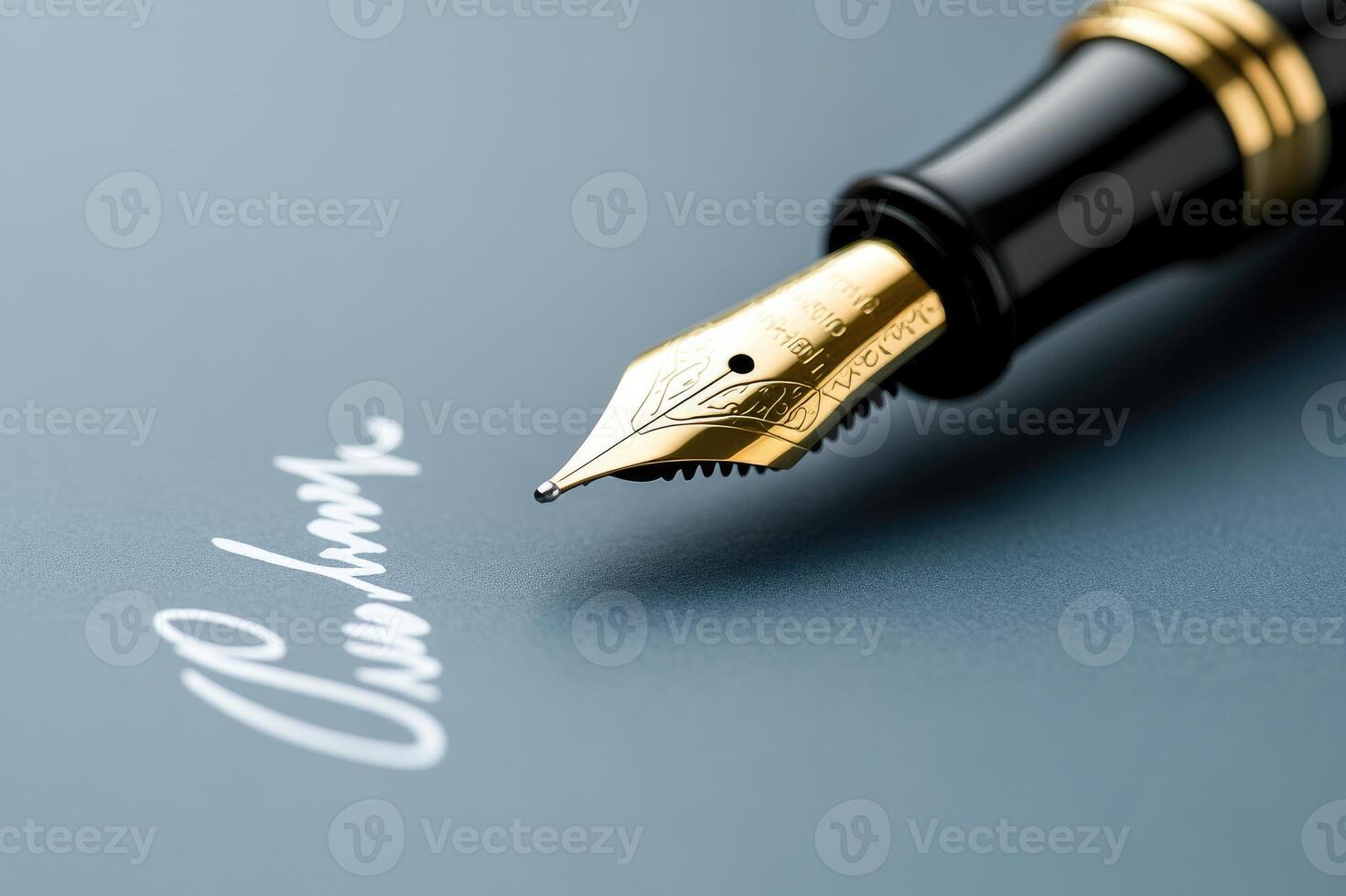 Golden fountain pen signing a document on blue paper photo