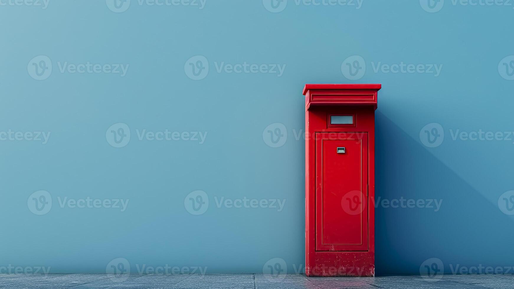 Red Mailbox on Blue Wall. Copy space, Postal Symbol, Urban Icon, Neighborhood Feature. photo