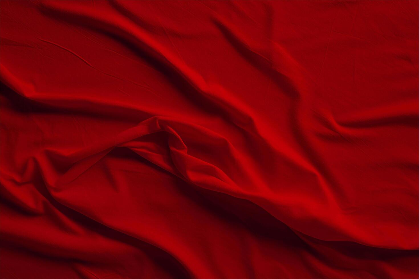 Red silk fabric with folds and folds photo
