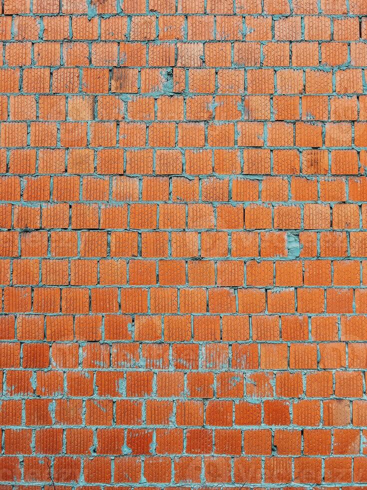 Orange clay building blocks pattern as design element photo