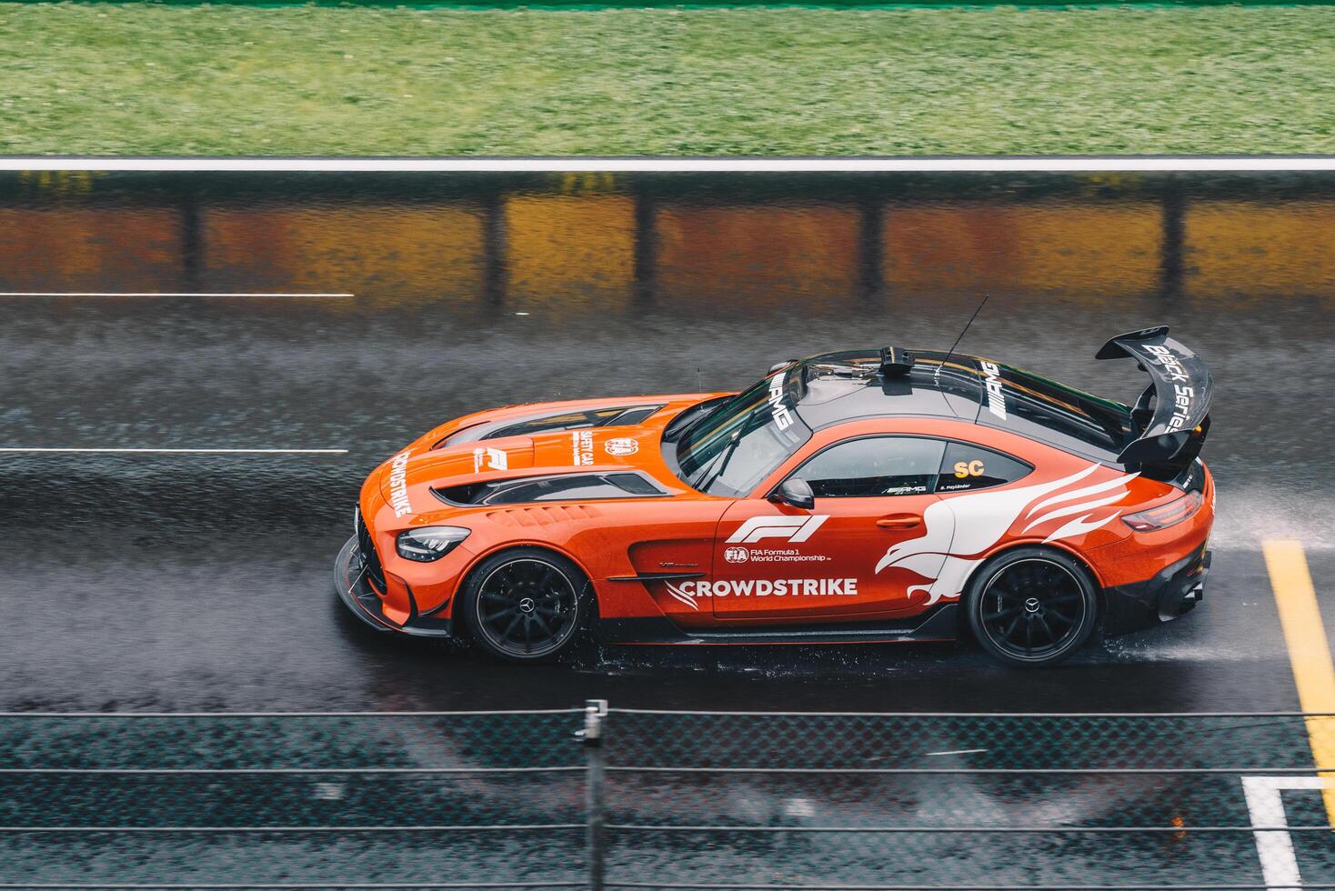 Spa Francoshamps, Belgium - Jul 27, 2024 - VFormula 1 Safet Car standing on the wet starting grid photo