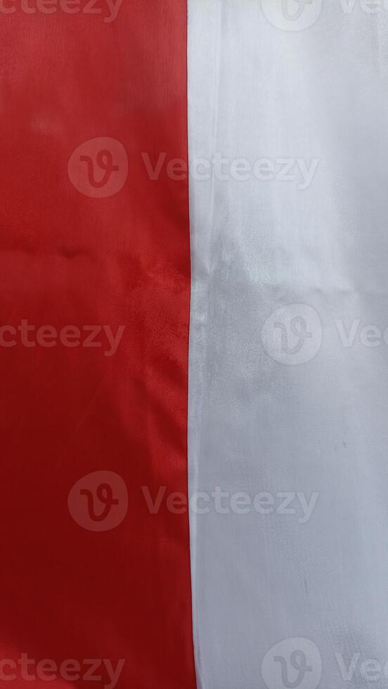 Close-Up of Indonesian Flag Fabric Showing Red and White Colors photo