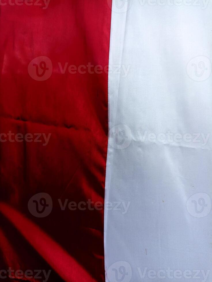Close-Up of Indonesian Flag Fabric Showing Red and White Colors photo