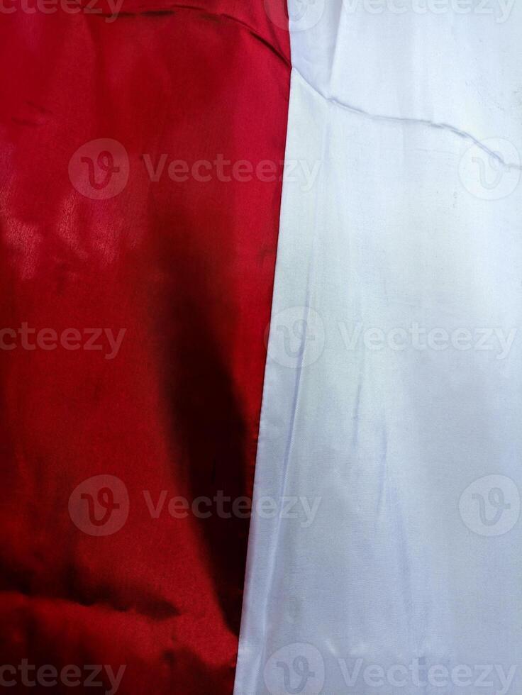 Close-Up of Indonesian Flag Fabric Showing Red and White Colors photo