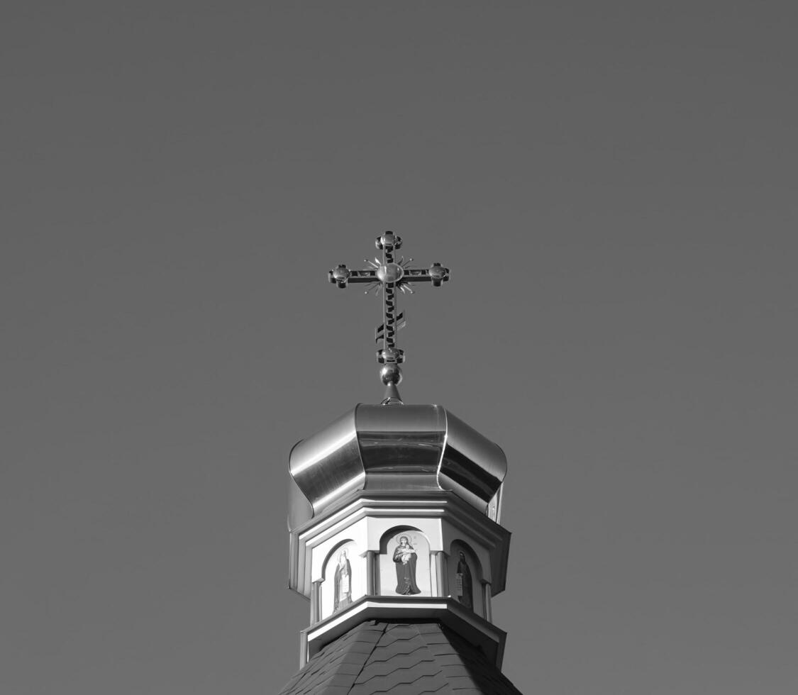 Orthodox church cross. Black and white monochrome grayscale photo background.