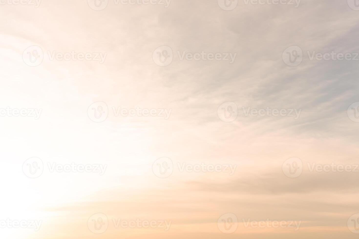 Beautiful morning or evening orange sky when sunsets or sunrises used as natural background texture in decorative art work photo