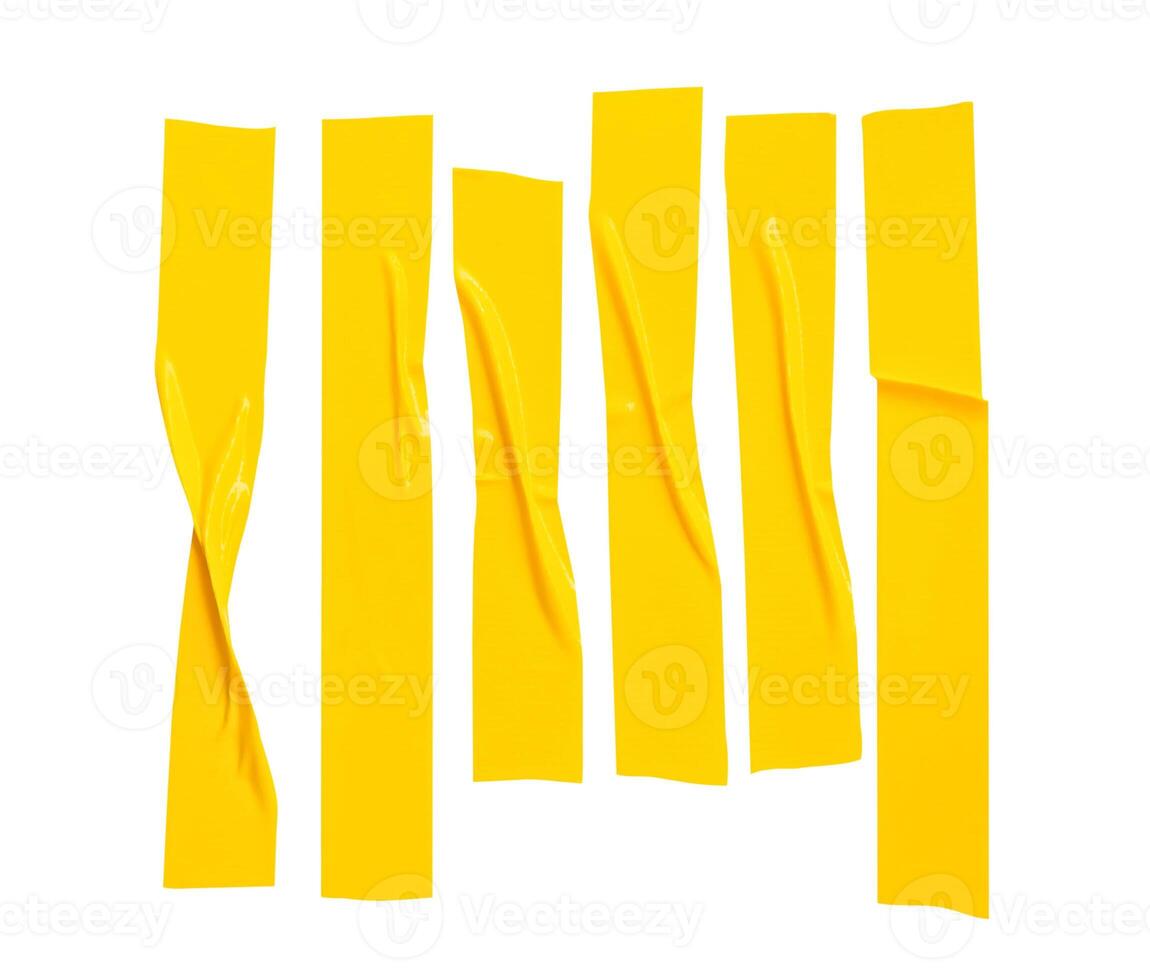 Top view set of wrinkled or crumpled yellow adhesive vinyl tape or cloth tape in stripes shape isolated on white background with clipping path photo