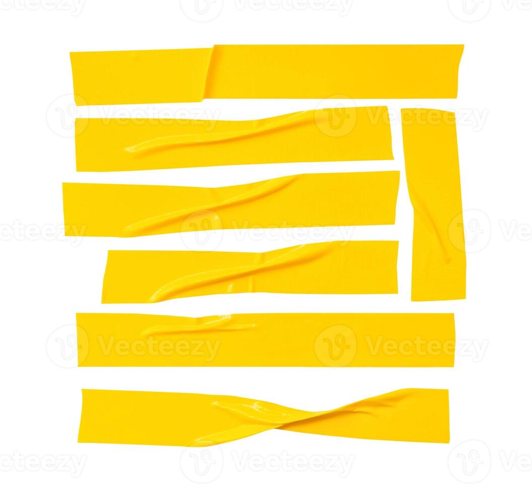 Top view set of wrinkled or crumpled yellow adhesive vinyl tape or cloth tape in stripes shape isolated on white background with clipping path photo