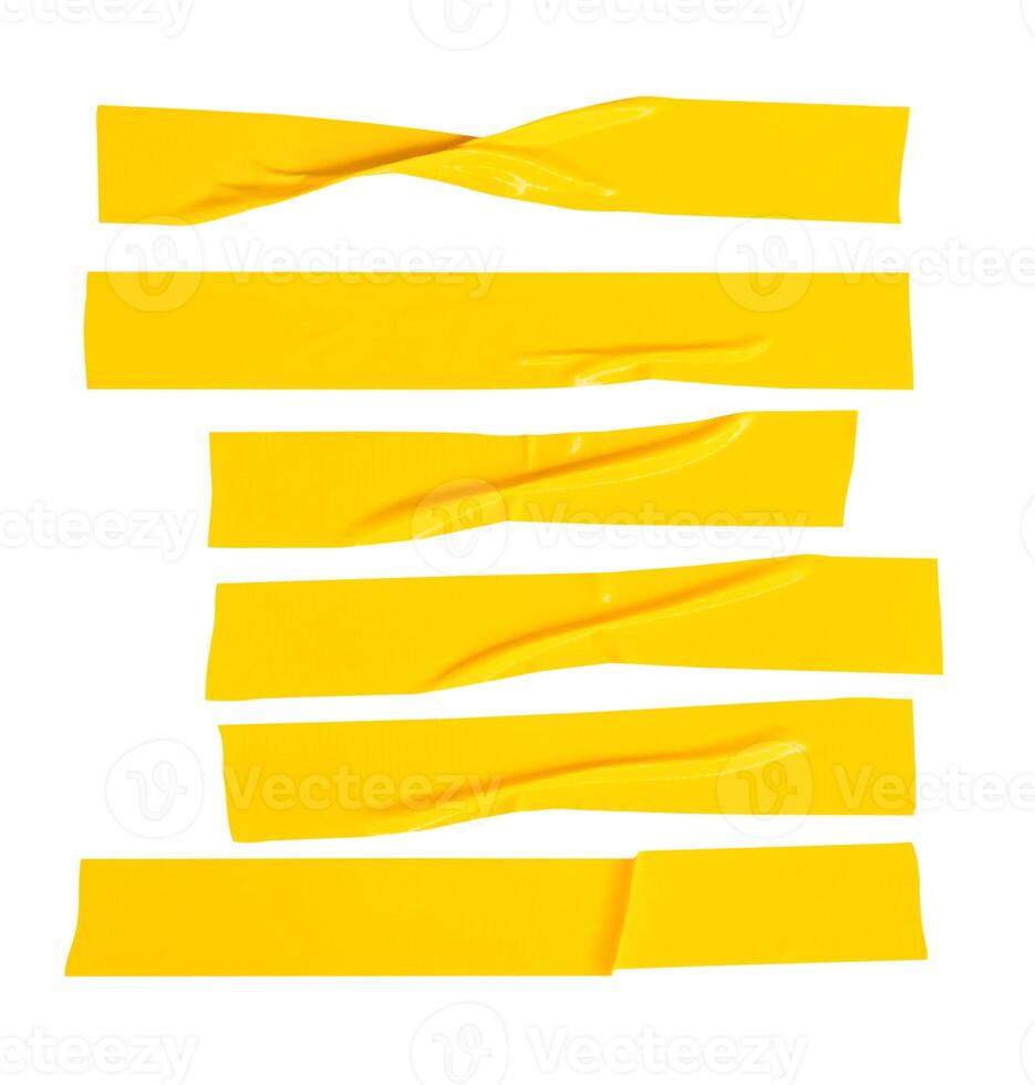 Top view set of wrinkled or crumpled yellow adhesive vinyl tape or cloth tape in stripes shape isolated on white background with clipping path photo