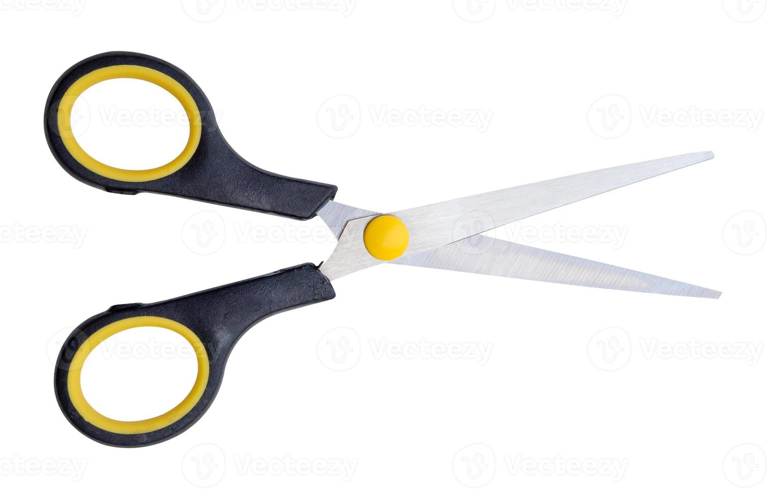 Top view of pair of multipurpose scissors with black and yellow handle isolated on white background with clipping path photo