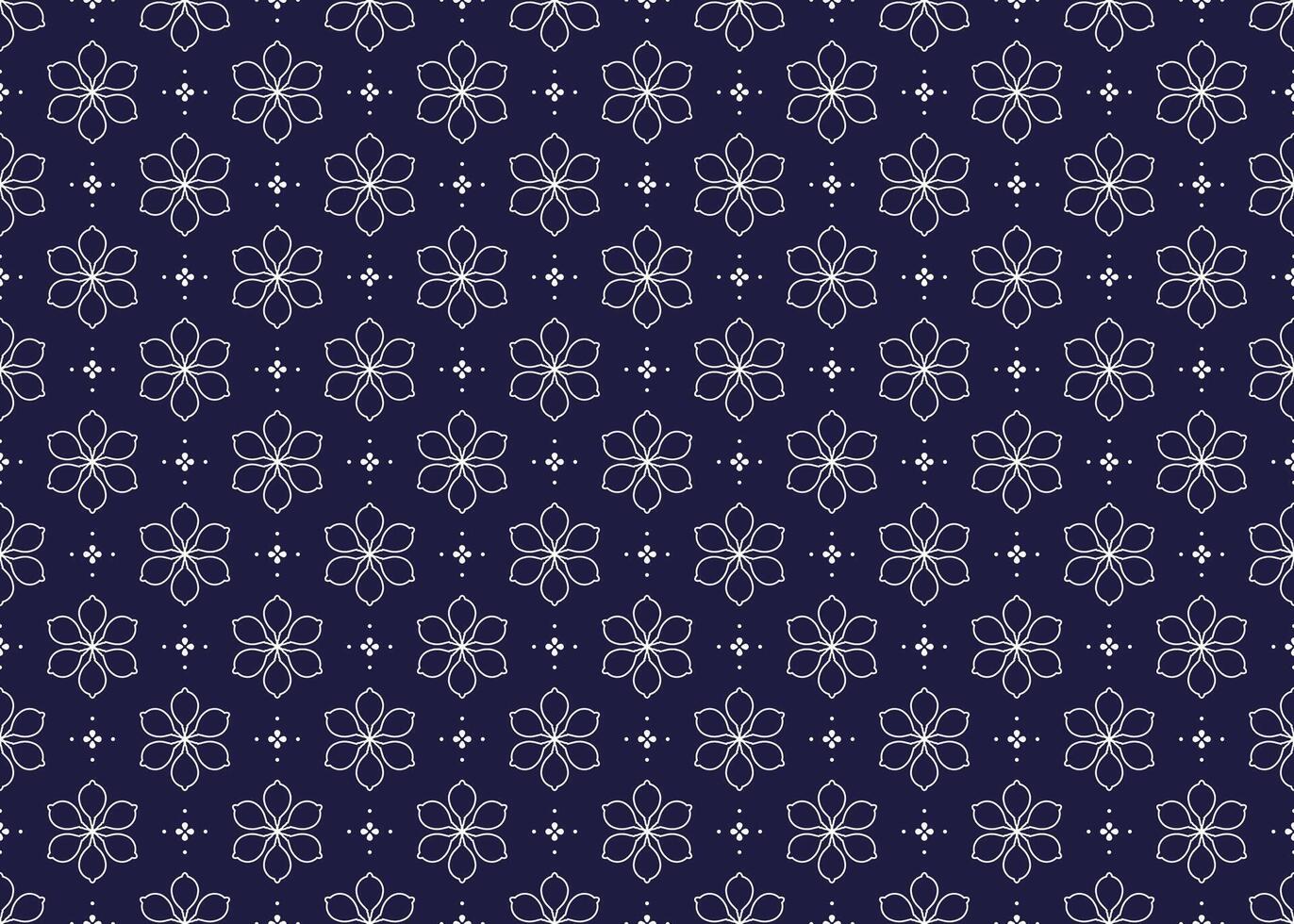 White symbol floral on dark blue background, ethnic fabric seamless pattern design for cloth, carpet, batik, wallpaper, wrapping etc. vector