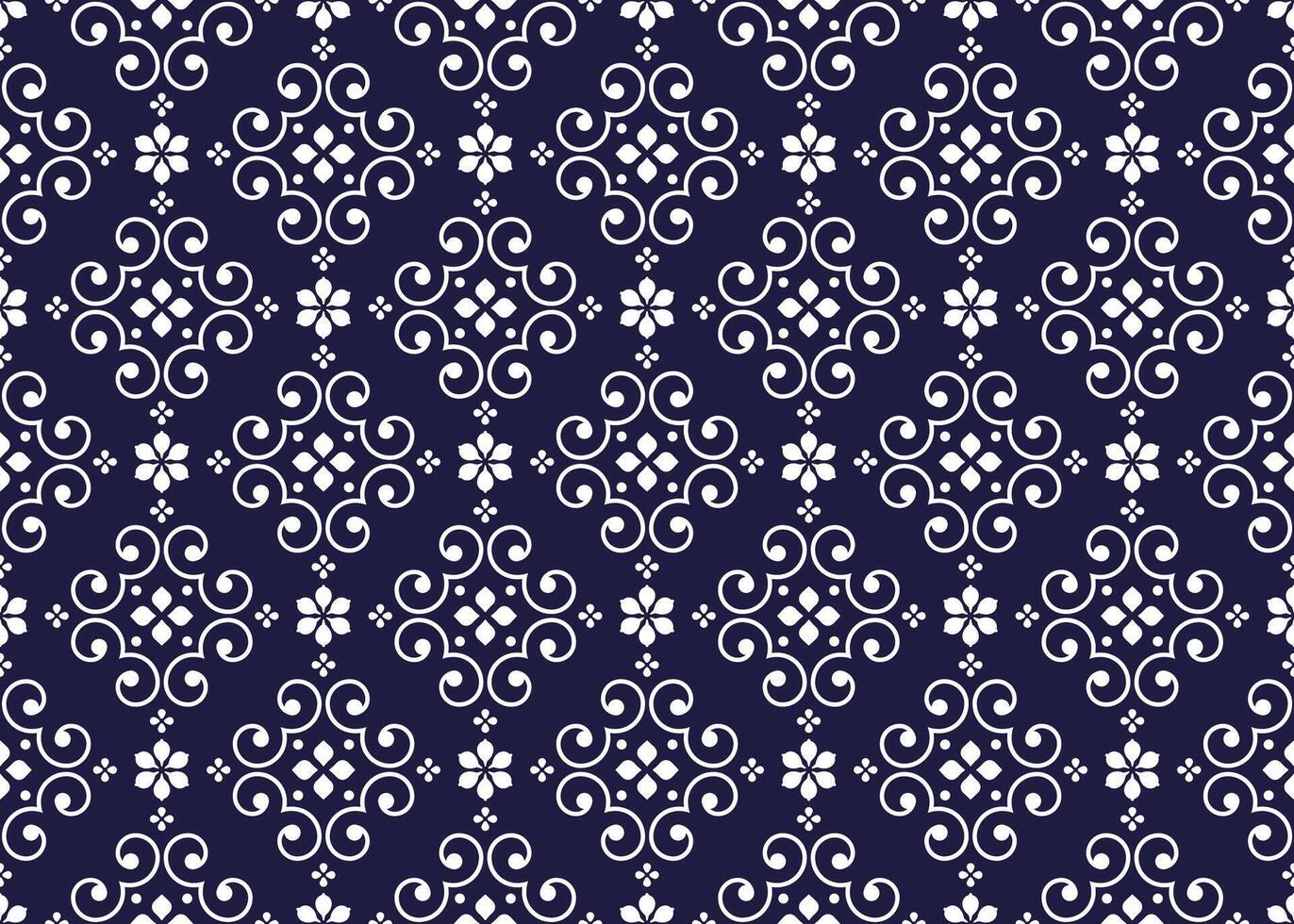 White symbol floral on dark blue background, ethnic fabric seamless pattern design for cloth, carpet, batik, wallpaper, wrapping etc. vector
