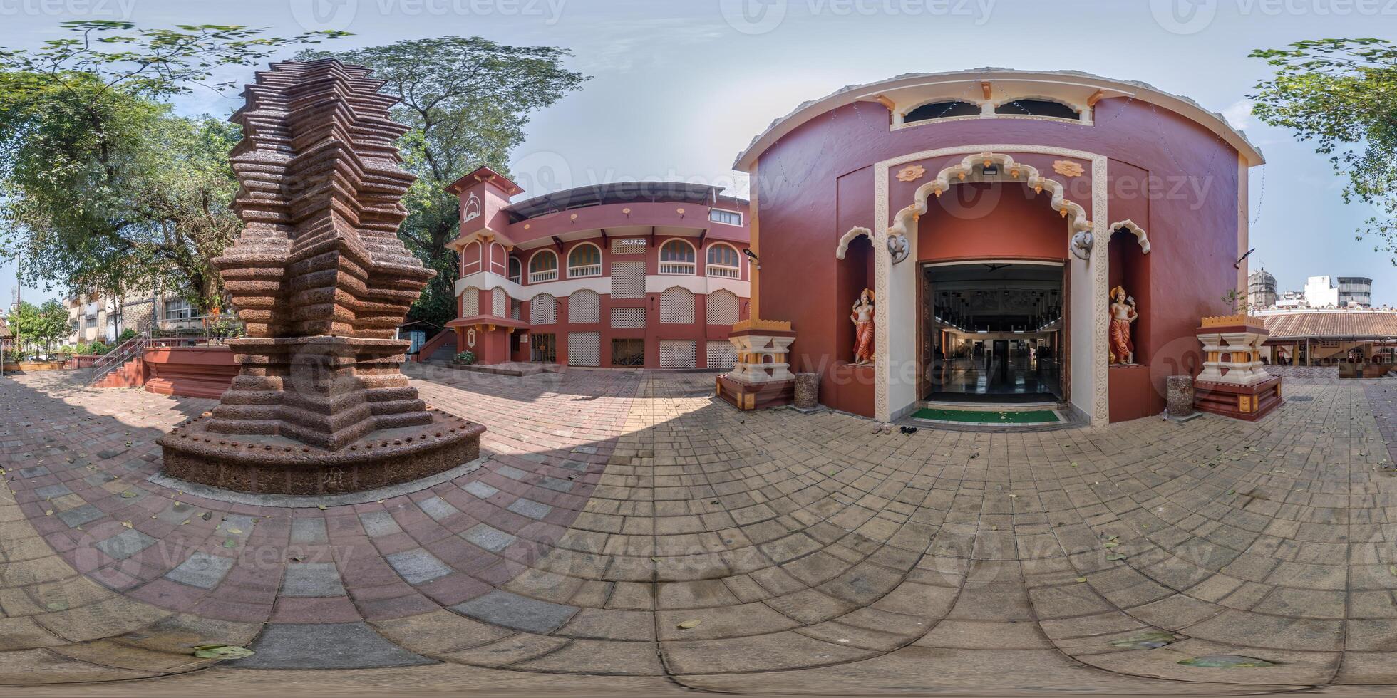 full hdri 360 panorama near hindu temple of goddess laxmi with gopuram tower in jungle among palm trees in Indian tropic town in equirectangular projection. VR AR content photo