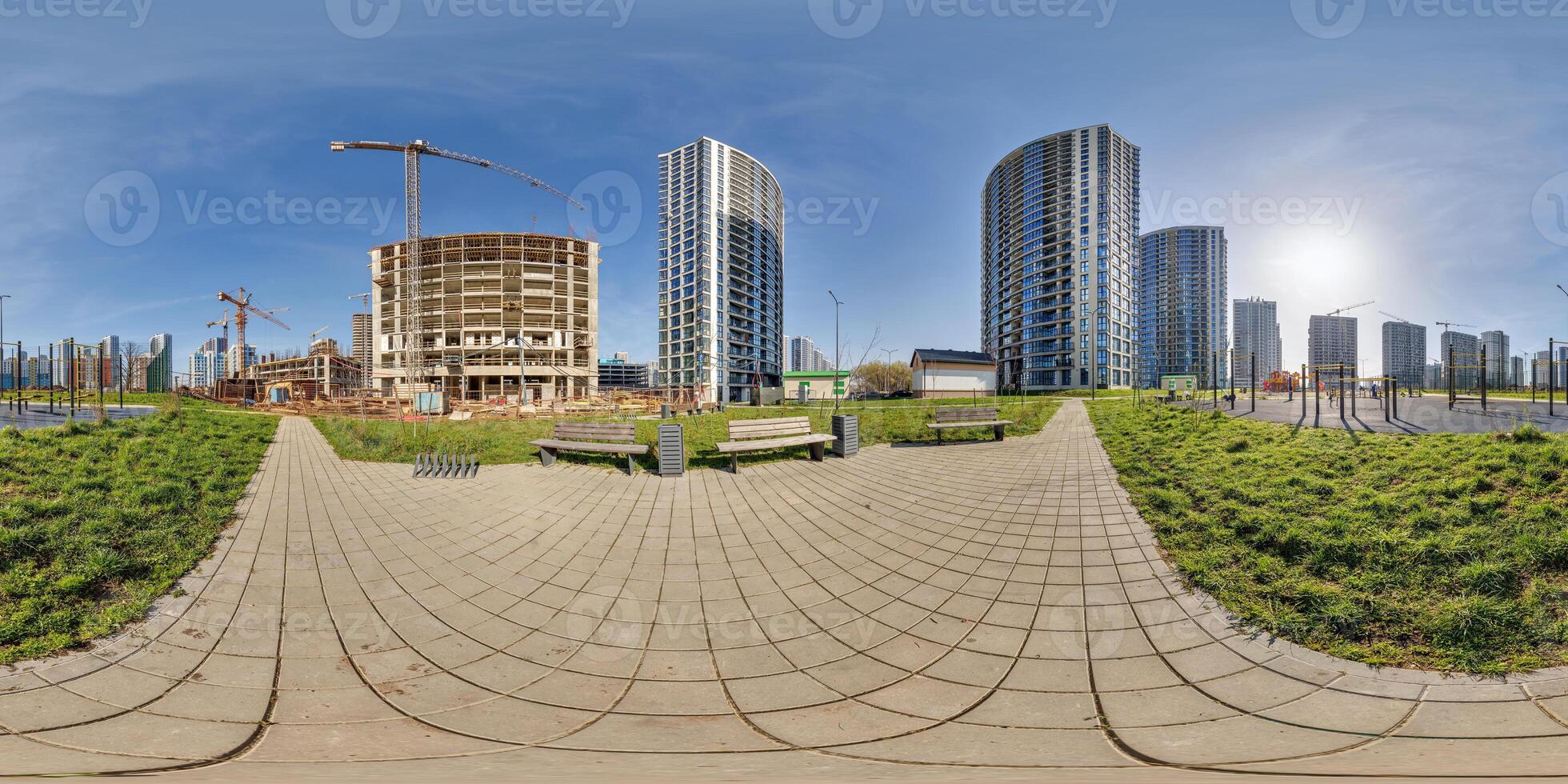 hdri 360 panorama near new with skyscrapers and residential complex under construction with high-rise tower cranes in full equirectangular seamless spherical projection photo
