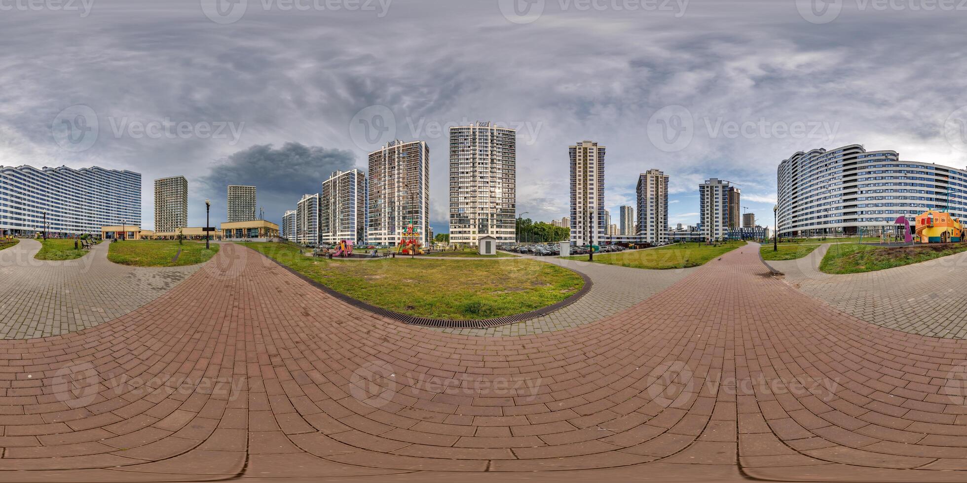 hdri 360 panorama near new skyscrapers and residential complex before storm with dark sky in full equirectangular seamless spherical projection photo