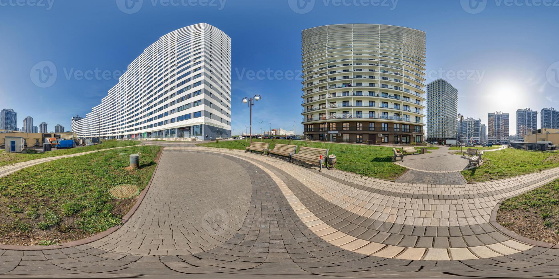 hdri 360 panorama near skyscraper multistory buildings of residential quarter complex in full equirectangular seamless spherical projection photo