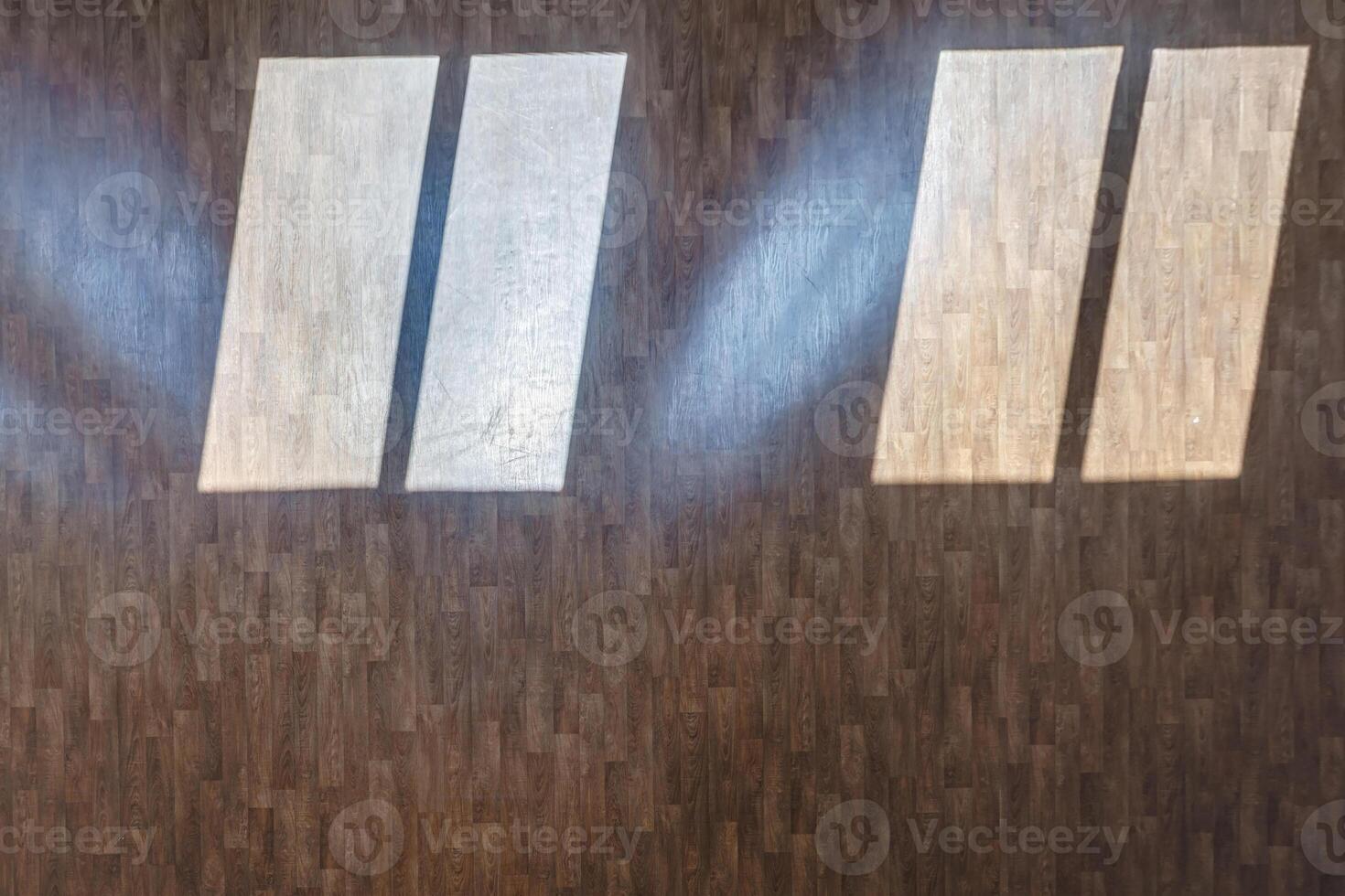 wooden and ceramic floor tiles texture in corridor, view from above with a shadow from the sun photo