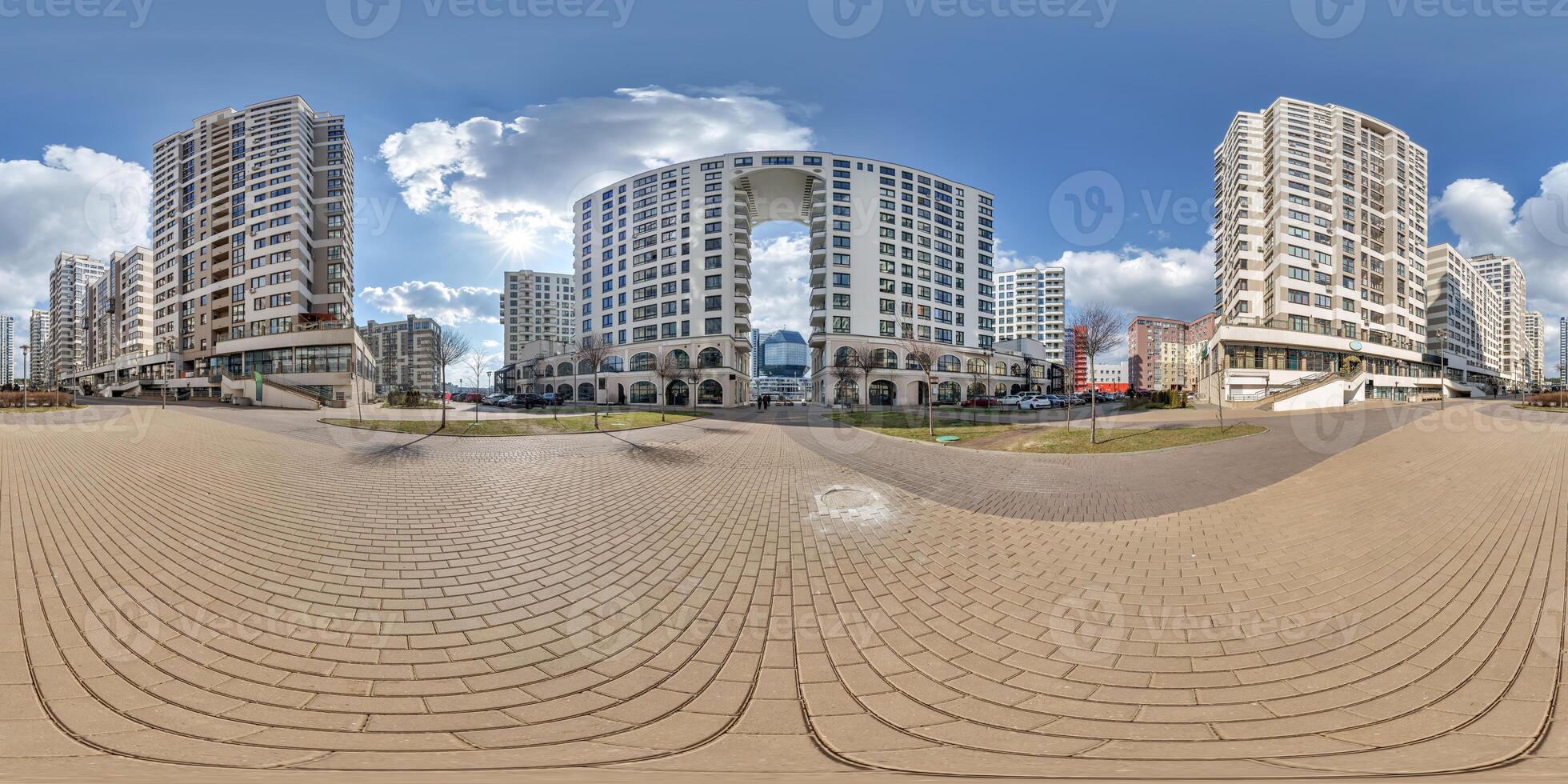 360 hdri panorama near skyscraper multistory buildings of residential quarter complex in full equirectangular seamless spherical projection photo