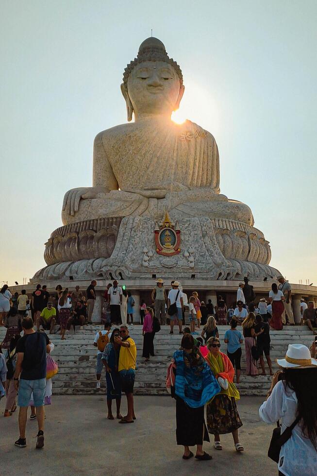 The giant statue of the Big Buddha is an iconic landmark made of concrete covered with white marble located on a hill with beautiful views in Phuket, Thailand on March 24, 2024 photo
