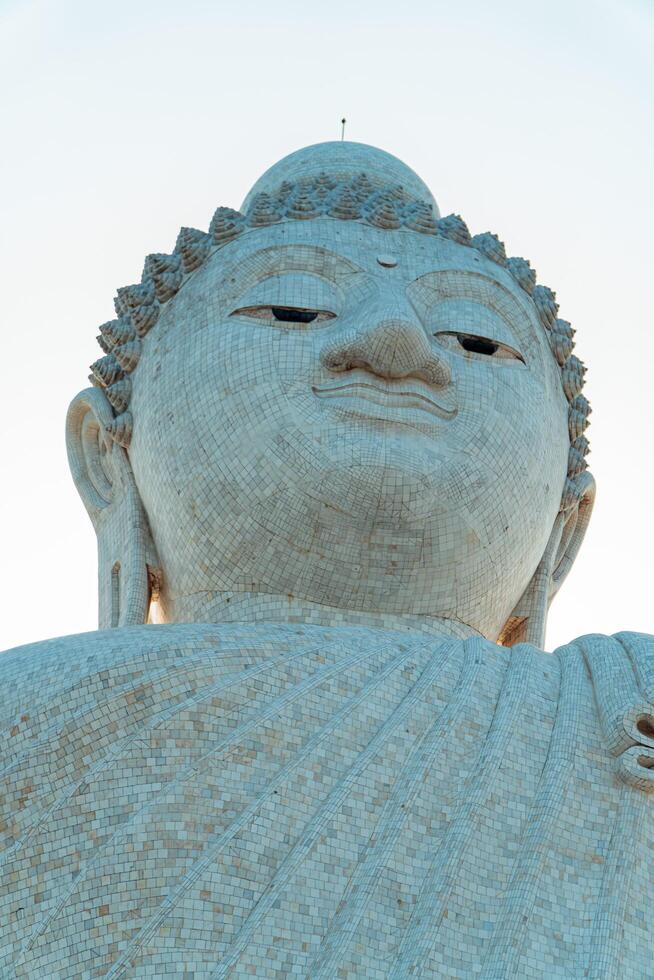 The giant statue of the Big Buddha is an iconic landmark made of concrete covered with white marble located on a hill with beautiful views in Phuket, Thailand on March 24, 2024 photo