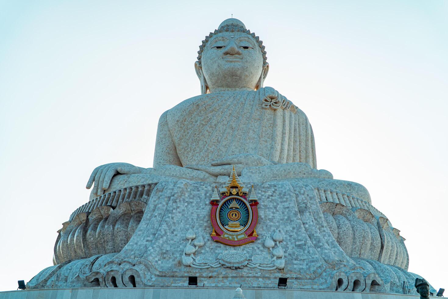 The giant statue of the Big Buddha is an iconic landmark made of concrete covered with white marble located on a hill with beautiful views in Phuket, Thailand on March 24, 2024 photo