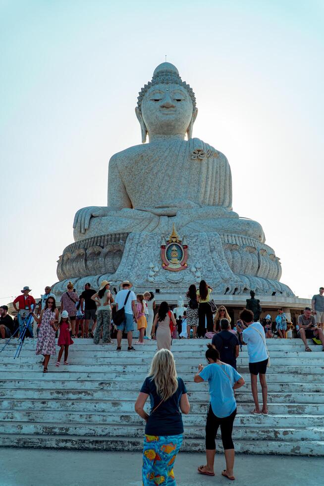 The giant statue of the Big Buddha is an iconic landmark made of concrete covered with white marble located on a hill with beautiful views in Phuket, Thailand on March 24, 2024 photo