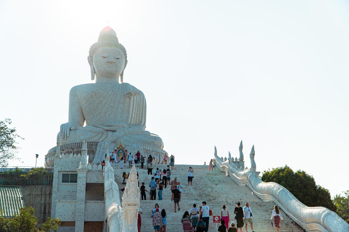 The giant statue of the Big Buddha is an iconic landmark made of concrete covered with white marble located on a hill with beautiful views in Phuket, Thailand on March 24, 2024 photo