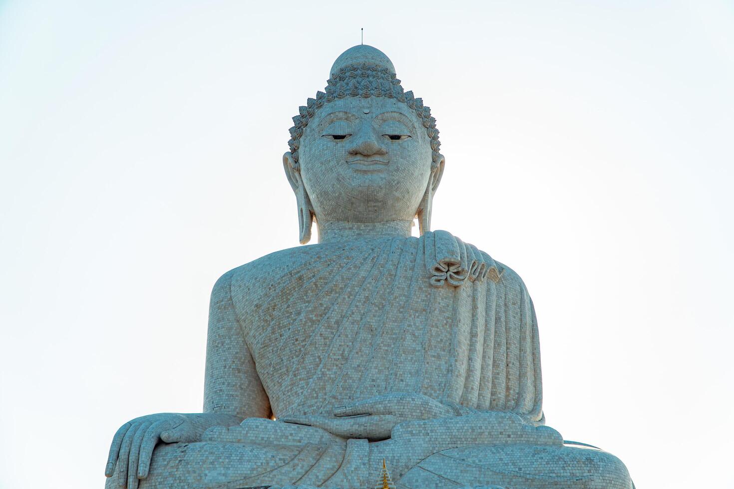 The giant statue of the Big Buddha is an iconic landmark made of concrete covered with white marble located on a hill with beautiful views in Phuket, Thailand on March 24, 2024 photo