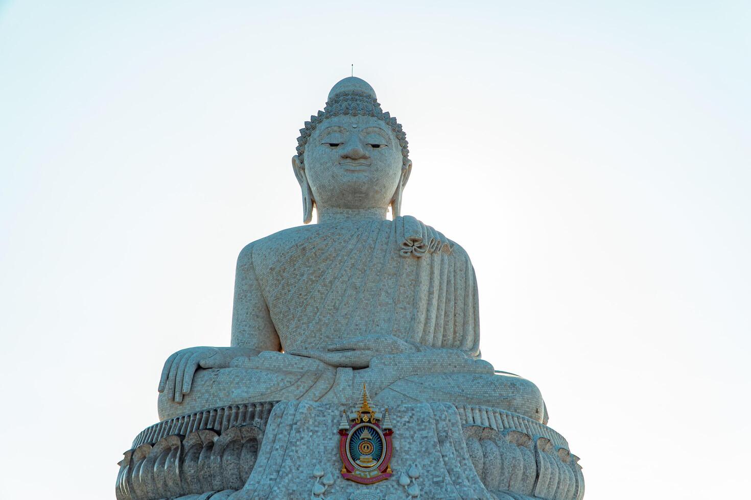 The giant statue of the Big Buddha is an iconic landmark made of concrete covered with white marble located on a hill with beautiful views in Phuket, Thailand on March 24, 2024 photo
