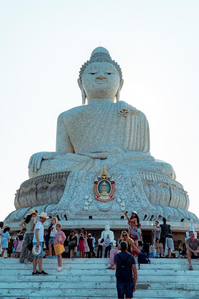 The giant statue of the Big Buddha is an iconic landmark made of concrete covered with white marble located on a hill with beautiful views in Phuket, Thailand on March 24, 2024 photo