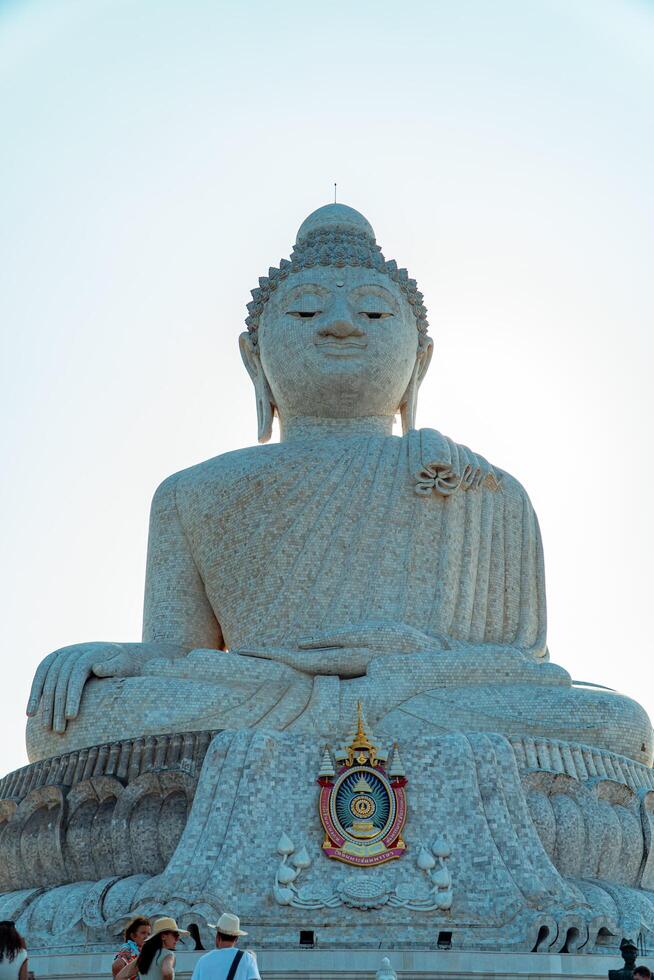 The giant statue of the Big Buddha is an iconic landmark made of concrete covered with white marble located on a hill with beautiful views in Phuket, Thailand on March 24, 2024 photo