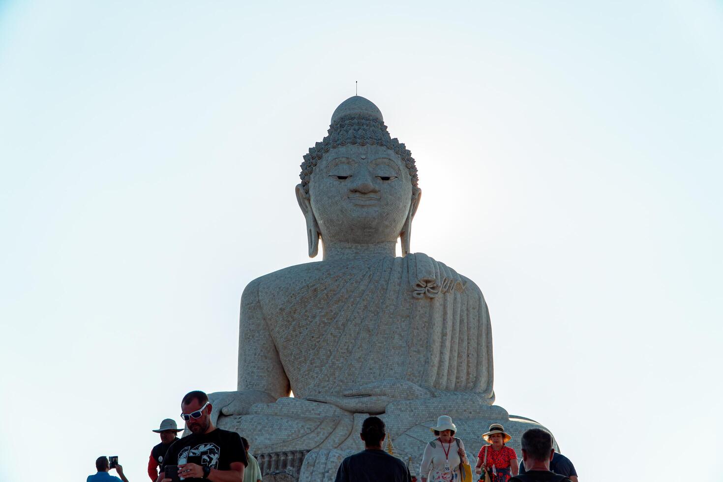 The giant statue of the Big Buddha is an iconic landmark made of concrete covered with white marble located on a hill with beautiful views in Phuket, Thailand on March 24, 2024 photo