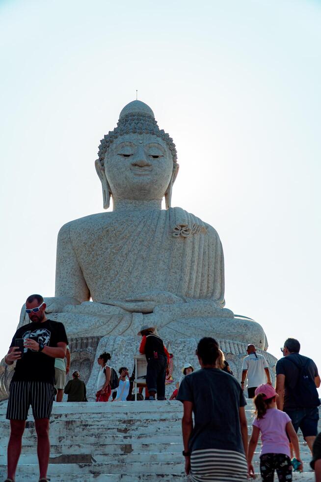 The giant statue of the Big Buddha is an iconic landmark made of concrete covered with white marble located on a hill with beautiful views in Phuket, Thailand on March 24, 2024 photo