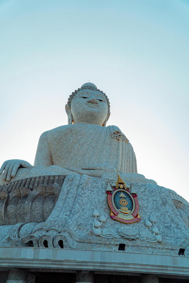 The giant statue of the Big Buddha is an iconic landmark made of concrete covered with white marble located on a hill with beautiful views in Phuket, Thailand on March 24, 2024 photo
