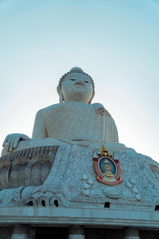 The giant statue of the Big Buddha is an iconic landmark made of concrete covered with white marble located on a hill with beautiful views in Phuket, Thailand on March 24, 2024 photo
