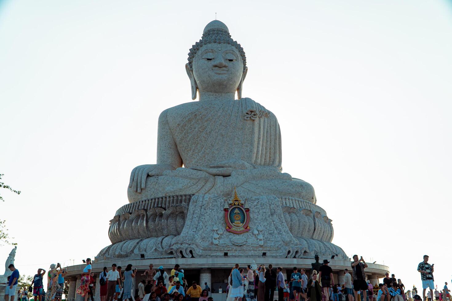 The giant statue of the Big Buddha is an iconic landmark made of concrete covered with white marble located on a hill with beautiful views in Phuket, Thailand on March 24, 2024 photo