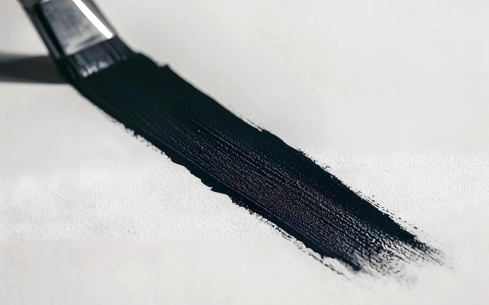 black stroke of paint brush effect isolated background photo
