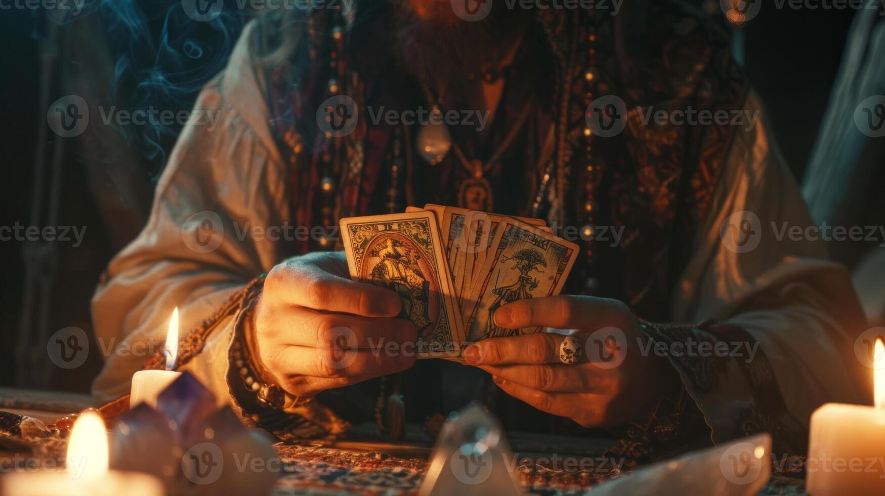 Mysterious Fortune Teller Shuffling Tarot Cards in a Candlelit Setting. Concept of Divination, Spirituality, Mysticism, Occult Practices photo