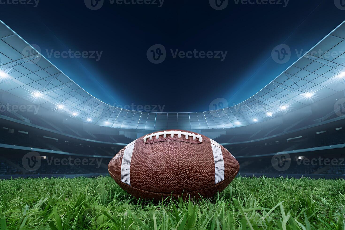 Illuminated stadium, football on grass, post game calm photo