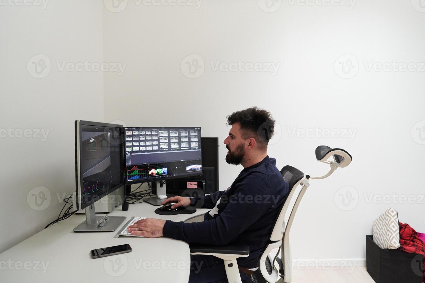 professional editor enhancing digital footage using specialized software photo